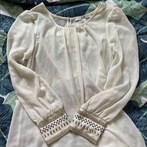 White, see-through blouse with beaded sleeves